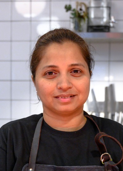 Porträtt av Manisha, North Indian-kock